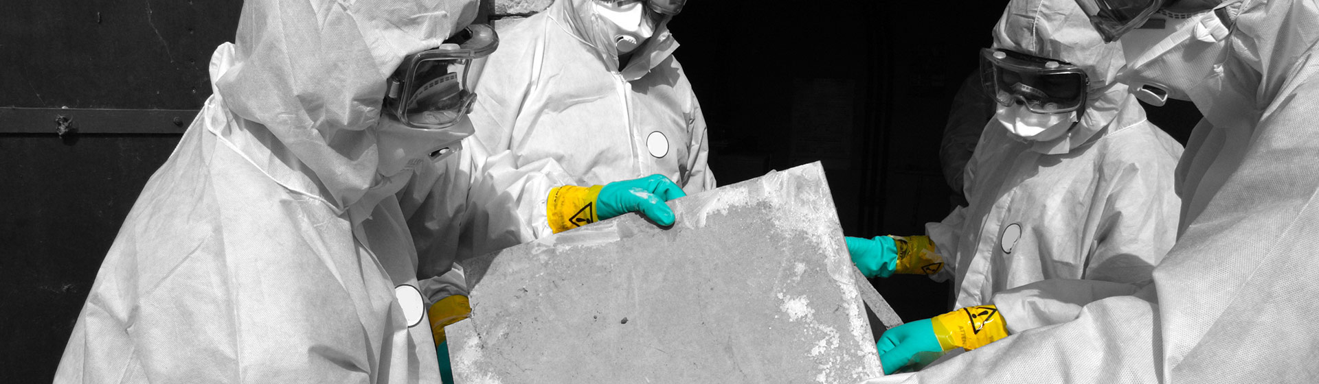 Asbestos removal operatives removing Asbestos